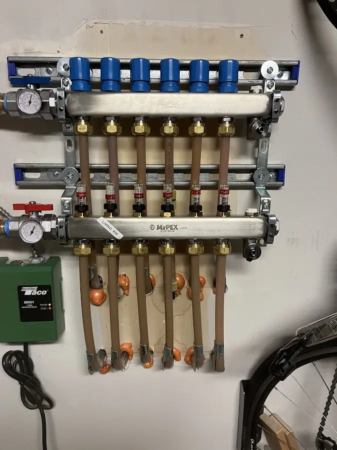 Plumber performing Water Heater Repair at a residential property in Dunstable